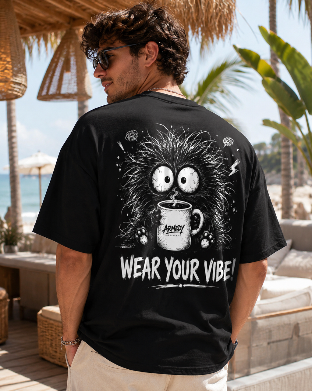 Detaliu spate tricou negru Armedy Society cu personaj coffee monster si mesaj Wear Your Vibe